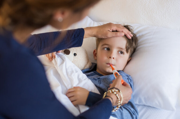 Healthcare professional speaking with a patient